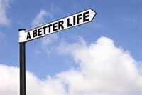 Picture of a road sign reading To A Better Life